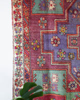 Vintage Turkish rug in living room setting, old rug, antique rug, pastel colors, faded colors, Turkish rug, vintage rug, soft rug, Portland, Oregon, rug store, rug shop, local shop