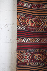 Vintage Anatolian kilim runner rug