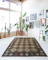 Vintage kilim rug in living room setting, bright colors, wild shaman, soft rug, bold color, Portland, Oregon, rug store, rug shop, local shop, vintage rug, modern kilim, warm colors
