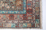 Vintage Turkish rug in living room setting, old rug, antique rug, pastel colors, faded colors, Turkish rug, vintage rug, soft rug, Portland, Oregon, rug store, rug shop, local shop
