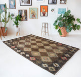 Vintage kilim rug in living room setting, bright colors, wild shaman, soft rug, bold color, Portland, Oregon, rug store, rug shop, local shop, vintage rug, modern kilim, warm colors