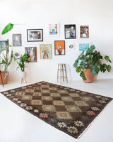 Vintage kilim rug in living room setting, bright colors, wild shaman, soft rug, bold color, Portland, Oregon, rug store, rug shop, local shop, vintage rug, modern kilim, warm colors