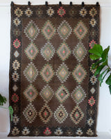 Vintage kilim rug in living room setting, bright colors, wild shaman, soft rug, bold color, Portland, Oregon, rug store, rug shop, local shop, vintage rug, modern kilim, warm colors