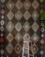 Vintage kilim rug in living room setting, bright colors, wild shaman, soft rug, bold color, Portland, Oregon, rug store, rug shop, local shop, vintage rug, modern kilim, warm colors