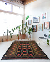Vintage kilim rug in living room setting, bright colors, wild shaman, soft rug, bold color, Portland, Oregon, rug store, rug shop, local shop, vintage rug, modern kilim, warm colors