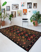 Vintage kilim rug in living room setting, bright colors, wild shaman, soft rug, bold color, Portland, Oregon, rug store, rug shop, local shop, vintage rug, modern kilim, warm colors