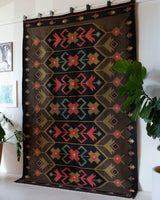 Vintage kilim rug in living room setting, bright colors, wild shaman, soft rug, bold color, Portland, Oregon, rug store, rug shop, local shop, vintage rug, modern kilim, warm colors