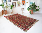 Vintage kilim rug in room decor setting, old rug, antique rug, pastel colors, faded colors, Turkish rug, vintage rug, soft rug, Portland, Oregon, rug store, rug shop, local shop, bold colors, bright colors, faded colors
