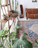 Vintage Turkish rug in living room setting, old rug, antique rug, pastel colors, faded colors, Turkish rug, vintage rug, soft rug, Portland, Oregon, rug store, rug shop, local shop