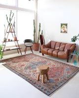 Vintage Turkish rug in living room setting, old rug, antique rug, pastel colors, faded colors, Turkish rug, vintage rug, soft rug, Portland, Oregon, rug store, rug shop, local shop