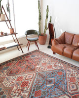 Vintage Turkish rug in living room setting, old rug, antique rug, pastel colors, faded colors, Turkish rug, vintage rug, soft rug, Portland, Oregon, rug store, rug shop, local shop