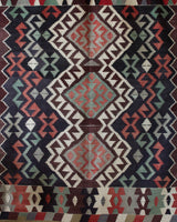 Vintage kilim rug in room decor setting, old rug, antique rug, pastel colors, faded colors, Turkish rug, vintage rug, soft rug, Portland, Oregon, rug store, rug shop, local shop, bold colors, bright colors, faded colors