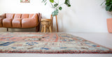 Vintage Turkish rug in living room setting, old rug, antique rug, pastel colors, faded colors, Turkish rug, vintage rug, soft rug, Portland, Oregon, rug store, rug shop, local shop