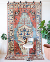 Vintage Turkish rug in living room setting, old rug, antique rug, pastel colors, faded colors, Turkish rug, vintage rug, soft rug, Portland, Oregon, rug store, rug shop, local shop