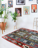 Vintage kilim rug in living room setting, bright colors, wild shaman, soft rug, bold color, Portland, Oregon, rug store, rug shop, local shop, vintage rug, modern kilim, warm colors