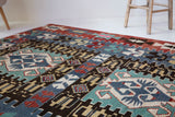 Vintage kilim rug in living room setting, bright colors, wild shaman, soft rug, bold color, Portland, Oregon, rug store, rug shop, local shop, vintage rug, modern kilim, warm colors