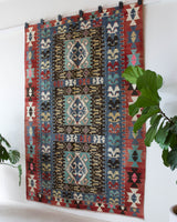 Vintage kilim rug in living room setting, bright colors, wild shaman, soft rug, bold color, Portland, Oregon, rug store, rug shop, local shop, vintage rug, modern kilim, warm colors