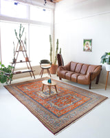 Vintage Turkish rug in a living room setting, pile rug, Turkish rug, vintage rug, portland, rug shop, bright colors, wild shaman, soft rug, bold color, Portland, Oregon, rug store, rug shop, local shop
