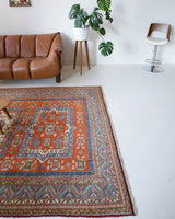 Vintage Turkish rug in a living room setting, pile rug, Turkish rug, vintage rug, portland, rug shop, bright colors, wild shaman, soft rug, bold color, Portland, Oregon, rug store, rug shop, local shop
