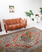 Vintage Turkish rug in living room setting, old rug, antique rug, pastel colors, faded colors, Turkish rug, vintage rug, soft rug, Portland, Oregon, rug store, rug shop, local shop