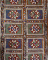 Vintage kilim rug in living room setting, old rug, antique rug, pastel colors, faded colors, Turkish rug, vintage rug, soft rug, Portland, Oregon, rug store, rug shop, local shop, earthy tones, earthy colors, warm colors