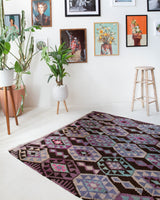 Vintage kilim rug in living room setting, bright colors, wild shaman, soft rug, bold color, Portland, Oregon, rug store, rug shop, local shop, vintage rug, modern kilim, warm colors
