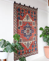 Vintage Turkish rug in a living room setting, pile rug, Turkish rug, vintage rug, portland, rug shop, bright colors, wild shaman, soft rug, bold color, Portland, Oregon, rug store, rug shop, local shop, antique rug