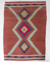 Vintage Turkish rug in a living room setting, pile rug, Turkish rug, vintage rug, portland, rug shop, bright colors, wild shaman, soft rug, bold color, Portland, Oregon, rug store, rug shop, local shop, antique rug