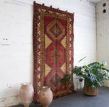 old rug, antique rug, Turkish rug, Portland, Oregon, rug store, rug shop, local shop, bright colors, wild shaman, large rug, area rug, red rug, bold color, burgundy, dark red
