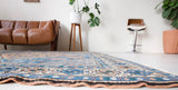 Vintage Turkish rug in living room setting, old rug, antique rug, pastel colors, faded colors, Turkish rug, vintage rug, soft rug, Portland, Oregon, rug store, rug shop, local shop