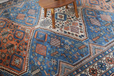Vintage Turkish rug in living room setting, old rug, antique rug, pastel colors, faded colors, Turkish rug, vintage rug, soft rug, Portland, Oregon, rug store, rug shop, local shop