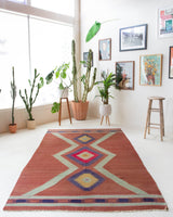 Vintage Turkish rug in a living room setting, pile rug, Turkish rug, vintage rug, portland, rug shop, bright colors, wild shaman, soft rug, bold color, Portland, Oregon, rug store, rug shop, local shop, antique rug