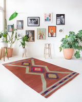 Vintage Turkish rug in a living room setting, pile rug, Turkish rug, vintage rug, portland, rug shop, bright colors, wild shaman, soft rug, bold color, Portland, Oregon, rug store, rug shop, local shop, antique rug