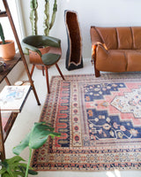 Vintage Turkish rug in living room setting, old rug, antique rug, pastel colors, faded colors, Turkish rug, vintage rug, soft rug, Portland, Oregon, rug store, rug shop, local shop