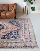 Vintage Turkish rug in living room setting, old rug, antique rug, pastel colors, faded colors, Turkish rug, vintage rug, soft rug, Portland, Oregon, rug store, rug shop, local shop