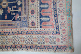 Vintage Turkish rug in living room setting, old rug, antique rug, pastel colors, faded colors, Turkish rug, vintage rug, soft rug, Portland, Oregon, rug store, rug shop, local shop