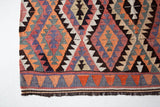 Vintage Turkish rug in a living room setting, pile rug, Turkish rug, vintage rug, portland, rug shop, bright colors, wild shaman, soft rug, bold color, Portland, Oregon, rug store, rug shop, local shop, antique rug