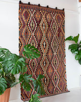 Vintage Turkish rug in a living room setting, pile rug, Turkish rug, vintage rug, portland, rug shop, bright colors, wild shaman, soft rug, bold color, Portland, Oregon, rug store, rug shop, local shop, antique rug
