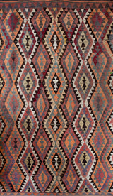 Vintage Turkish rug in a living room setting, pile rug, Turkish rug, vintage rug, portland, rug shop, bright colors, wild shaman, soft rug, bold color, Portland, Oregon, rug store, rug shop, local shop, antique rug