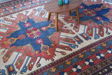 Vintage Turkish rug in living room setting, old rug, antique rug, pastel colors, faded colors, Turkish rug, vintage rug, soft rug, Portland, Oregon, rug store, rug shop, local shop