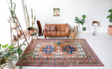 Vintage Turkish rug in living room setting, old rug, antique rug, pastel colors, faded colors, Turkish rug, vintage rug, soft rug, Portland, Oregon, rug store, rug shop, local shop