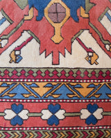 Vintage Turkish rug in living room setting, old rug, antique rug, pastel colors, faded colors, Turkish rug, vintage rug, soft rug, Portland, Oregon, rug store, rug shop, local shop