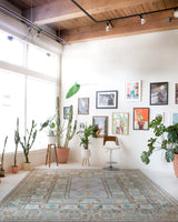 Vintage Turkish runner rug in living room setting, old rug, antique rug, pastel colors, faded colors, Turkish rug, vintage rug, soft rug, Portland, Oregon, rug store, rug shop, local shop