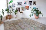 Vintage Turkish runner rug in living room setting, old rug, antique rug, pastel colors, faded colors, Turkish rug, vintage rug, soft rug, Portland, Oregon, rug store, rug shop, local shop