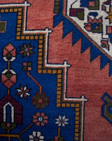 Vintage Turkish rug in a living room setting, pile rug, Turkish rug, vintage rug, portland, rug shop, bright colors, wild shaman, soft rug, bold color, Portland, Oregon, rug store, rug shop, local shop