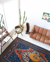 Vintage Turkish rug in a living room setting, pile rug, Turkish rug, vintage rug, portland, rug shop, bright colors, wild shaman, soft rug, bold color, Portland, Oregon, rug store, rug shop, local shop