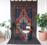 Vintage Turkish rug in a living room setting, pile rug, Turkish rug, vintage rug, portland, rug shop, bright colors, wild shaman, soft rug, bold color, Portland, Oregon, rug store, rug shop, local shop