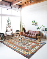 Vintage Turkish rug in a living room setting, pile rug, Turkish rug, vintage rug, portland, rug shop, bright colors, wild shaman, soft rug, bold color, Portland, Oregon, rug store, rug shop, local shop