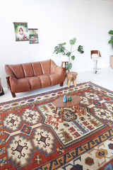 Vintage Turkish rug in a living room setting, pile rug, Turkish rug, vintage rug, portland, rug shop, bright colors, wild shaman, soft rug, bold color, Portland, Oregon, rug store, rug shop, local shop