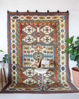 Vintage Turkish rug in a living room setting, pile rug, Turkish rug, vintage rug, portland, rug shop, bright colors, wild shaman, soft rug, bold color, Portland, Oregon, rug store, rug shop, local shop